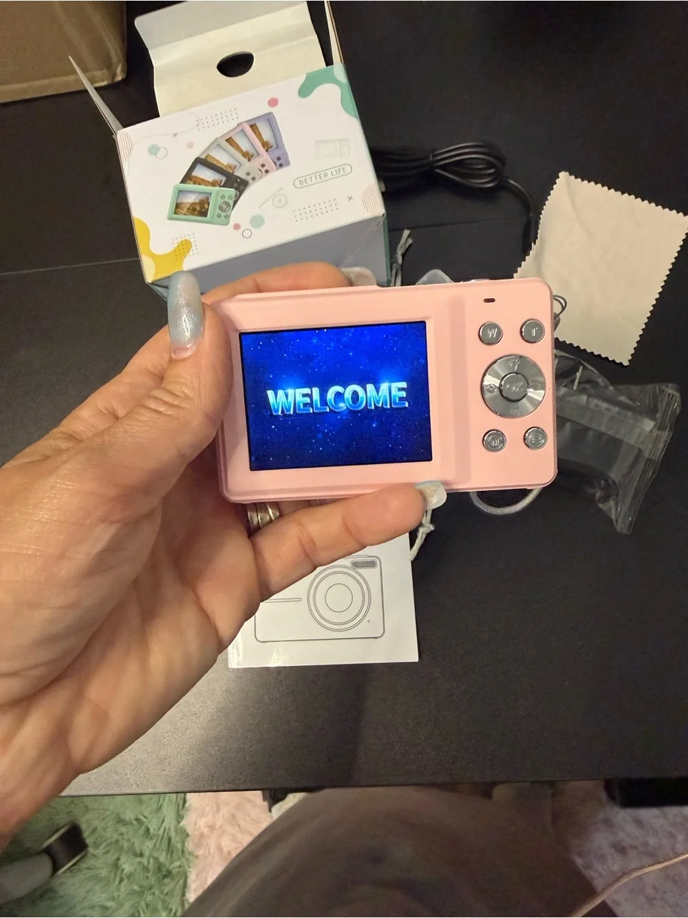 Pink Point-and-Shoot Digital Camera with Accessories